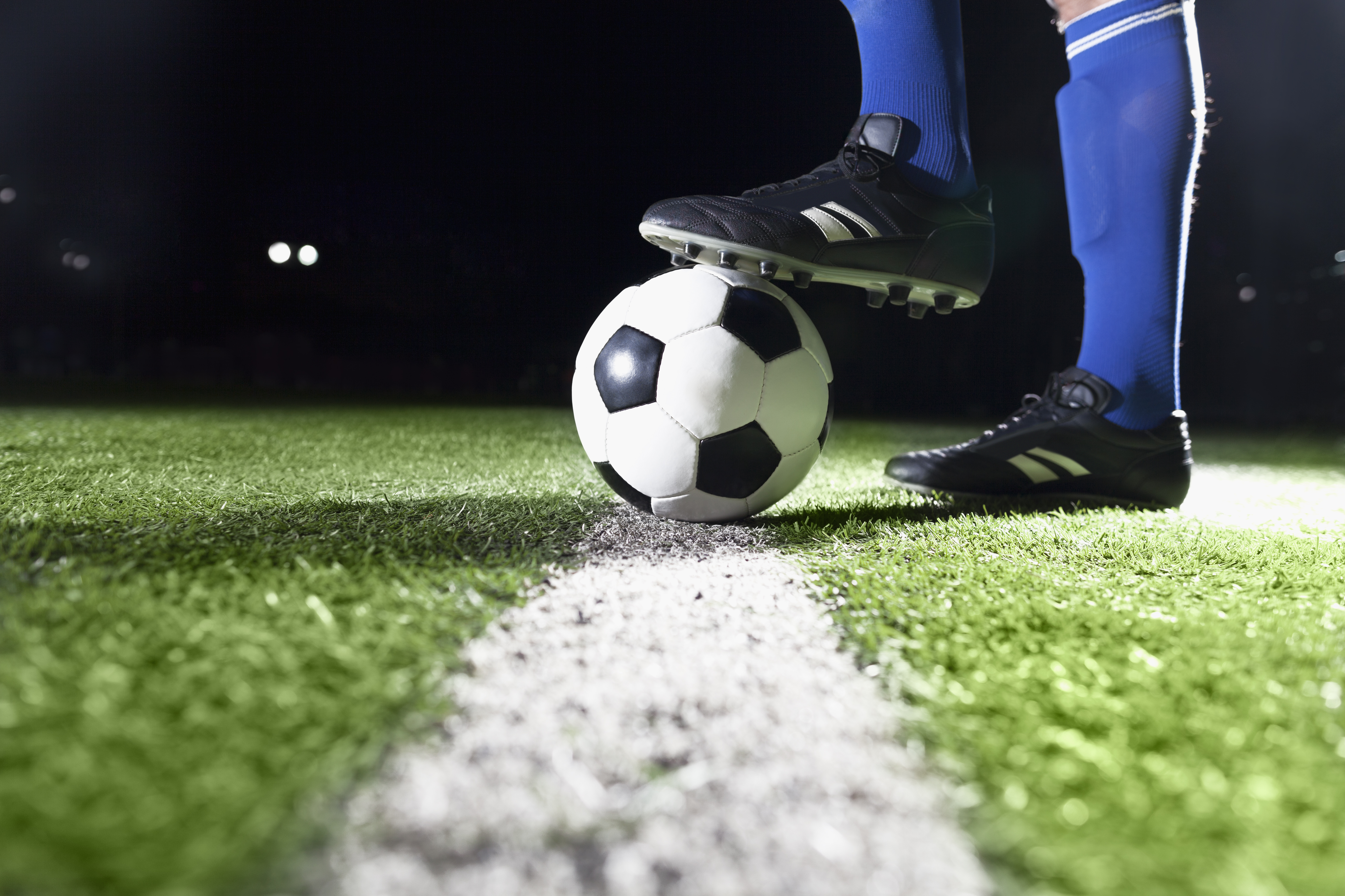 Jogador de Futebol em campo antes do uso de álcool e outras drogas